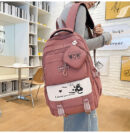 Wholesale custom student backpack front view on model, showing perfect size for school use and daily commute